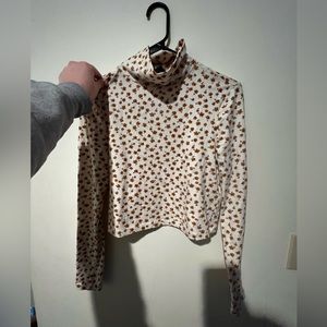 Red and gold floral turtleneck crop top from Forever 21.